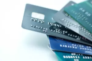 Blue middle credit card chosen from group of 5 cards.