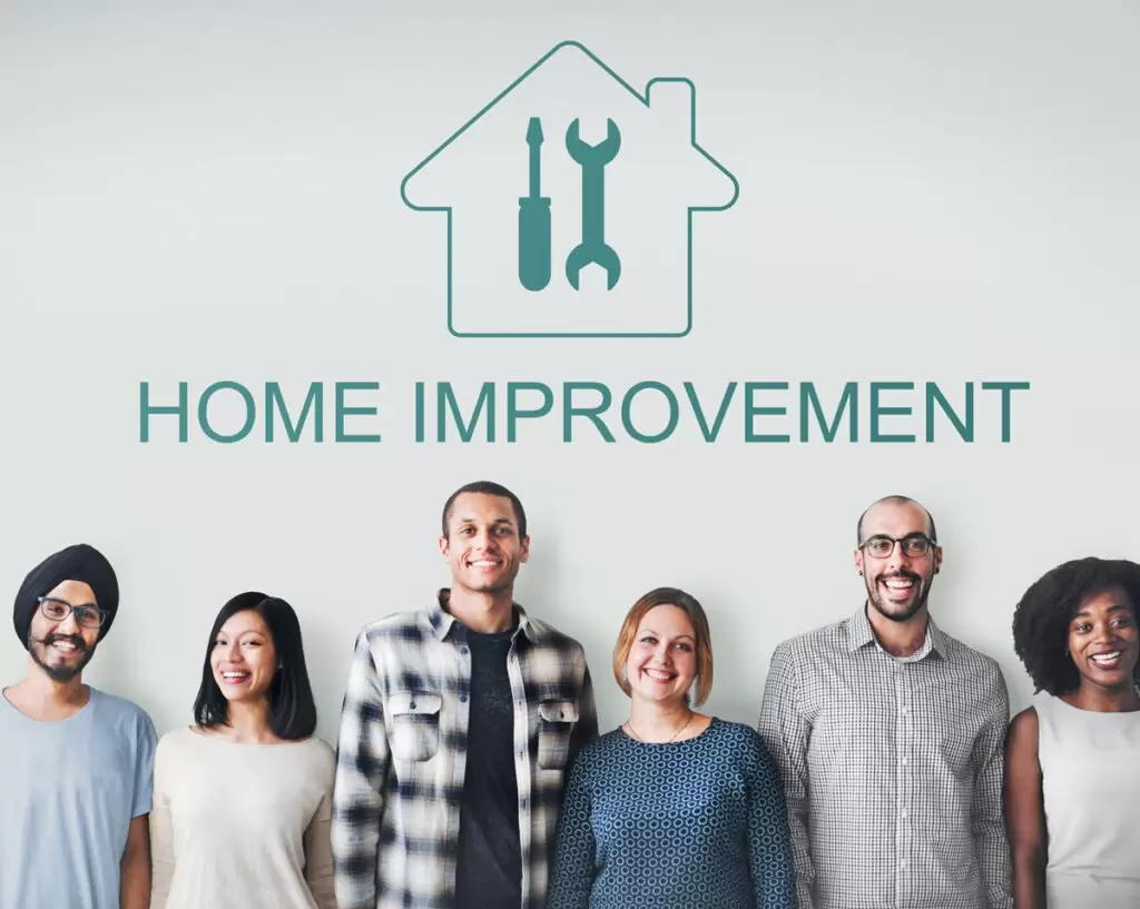 Outline of home improvement tools above a diverse group of people. Outline of home improvement tools above a diverse group of people.