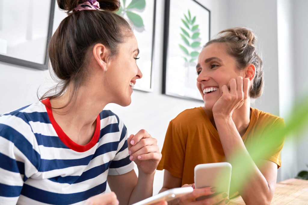 Comparing Top $3,000 Personal Loans People using smartphones to compare top $3,000 personal loan offers.