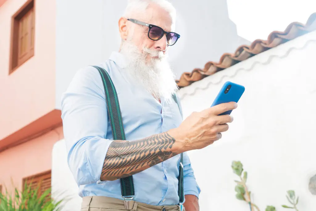 Comparing Top $1,500 Personal Loans A person using a smartphone to compare top $1,500 personal loan offers.