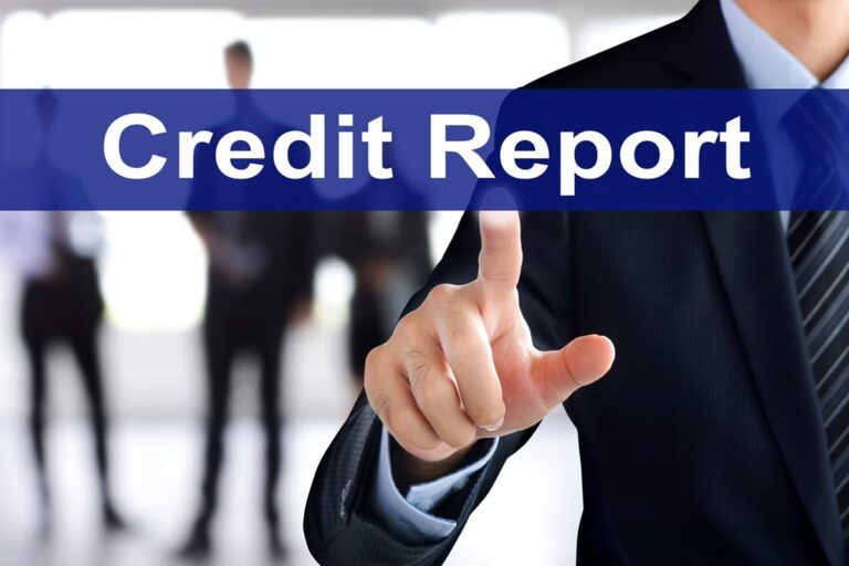 Professional in a business environment touching a digital interface displaying Credit Report to check a company's credit score.